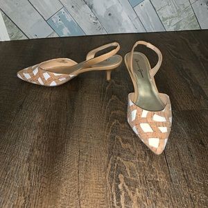 tan and white pumps